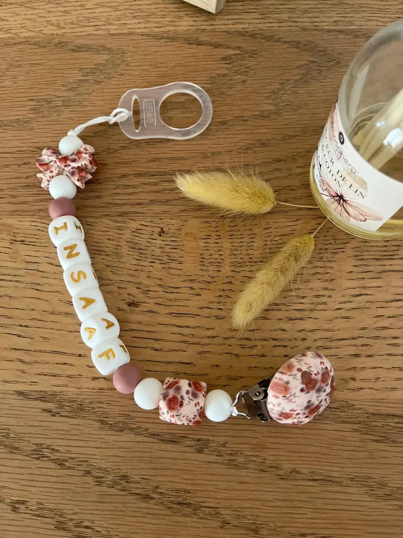 Attache tétine Florale