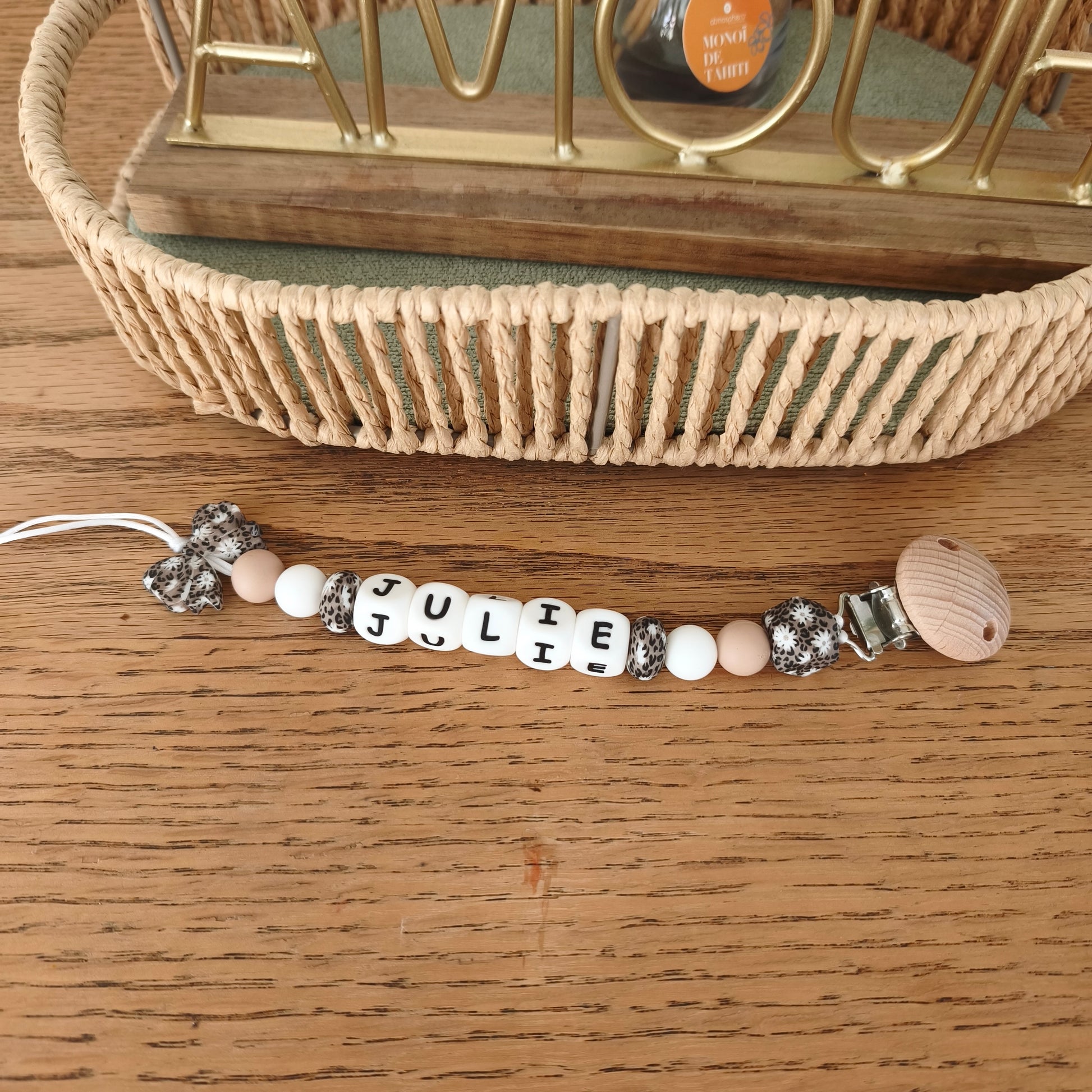 Attache tétine noeud leopard