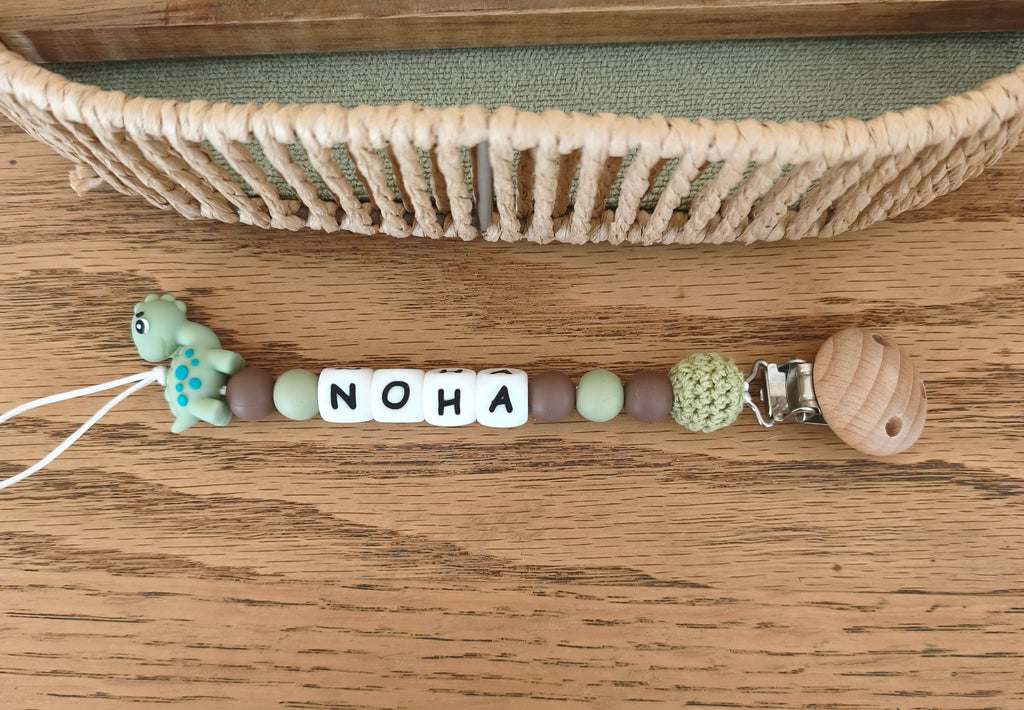 Attache tétine dinosaure