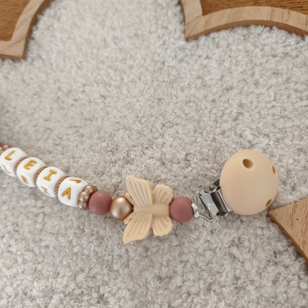 Attache tétine papillon