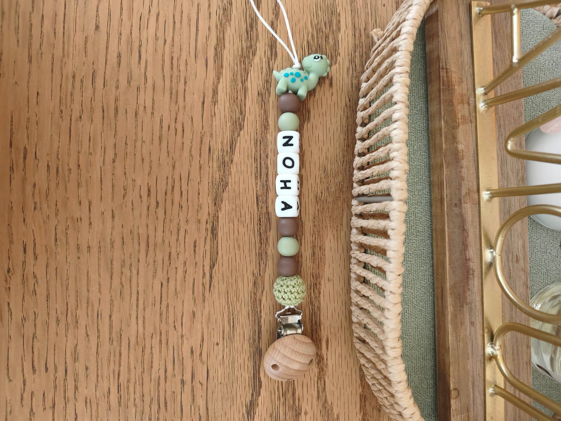 Attache tétine dinosaure