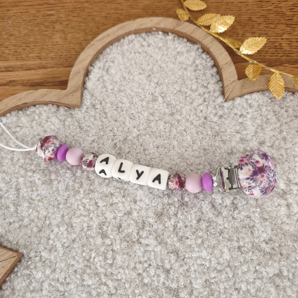 Attache tétine violette