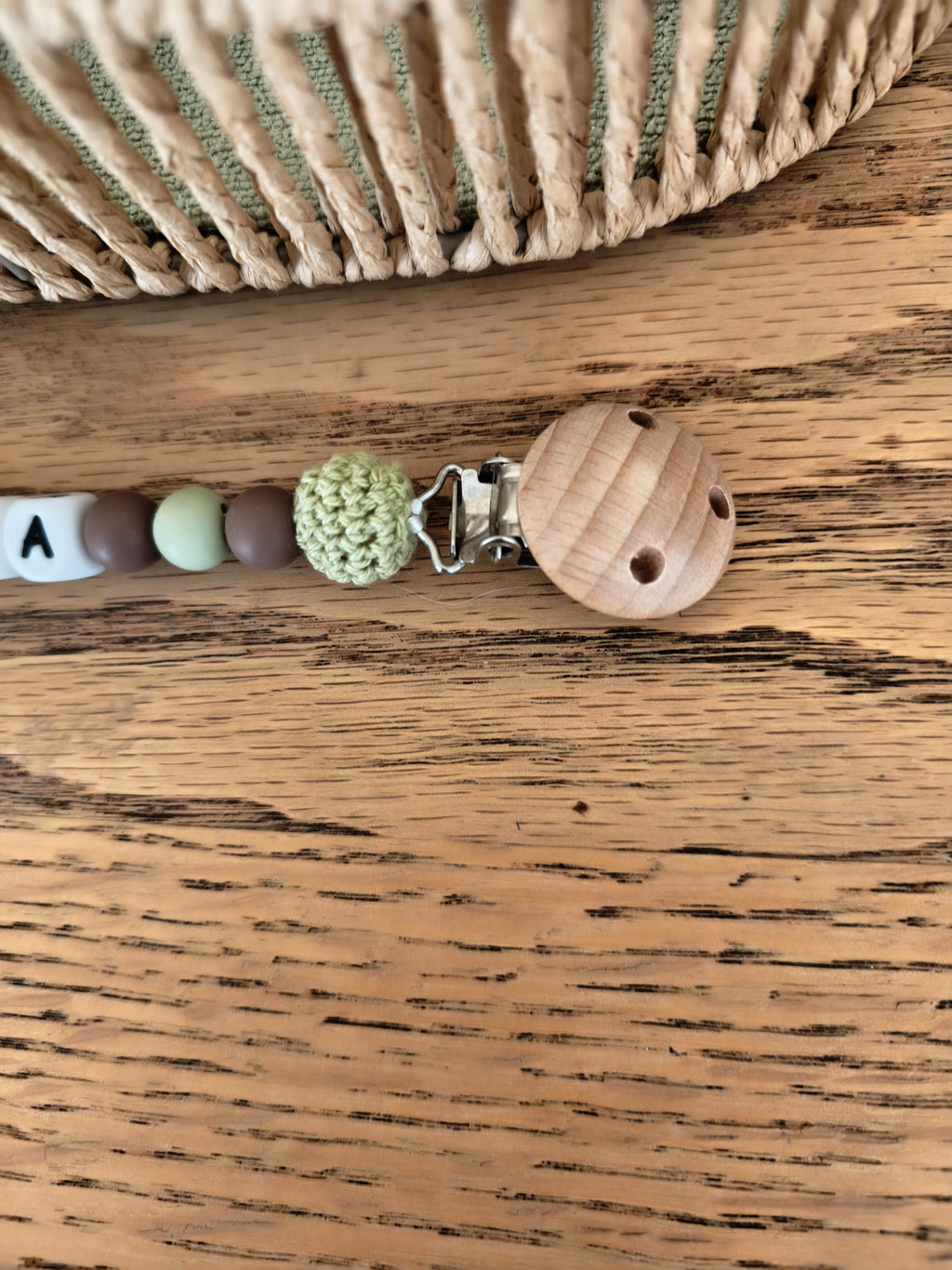 Attache tétine dinosaure