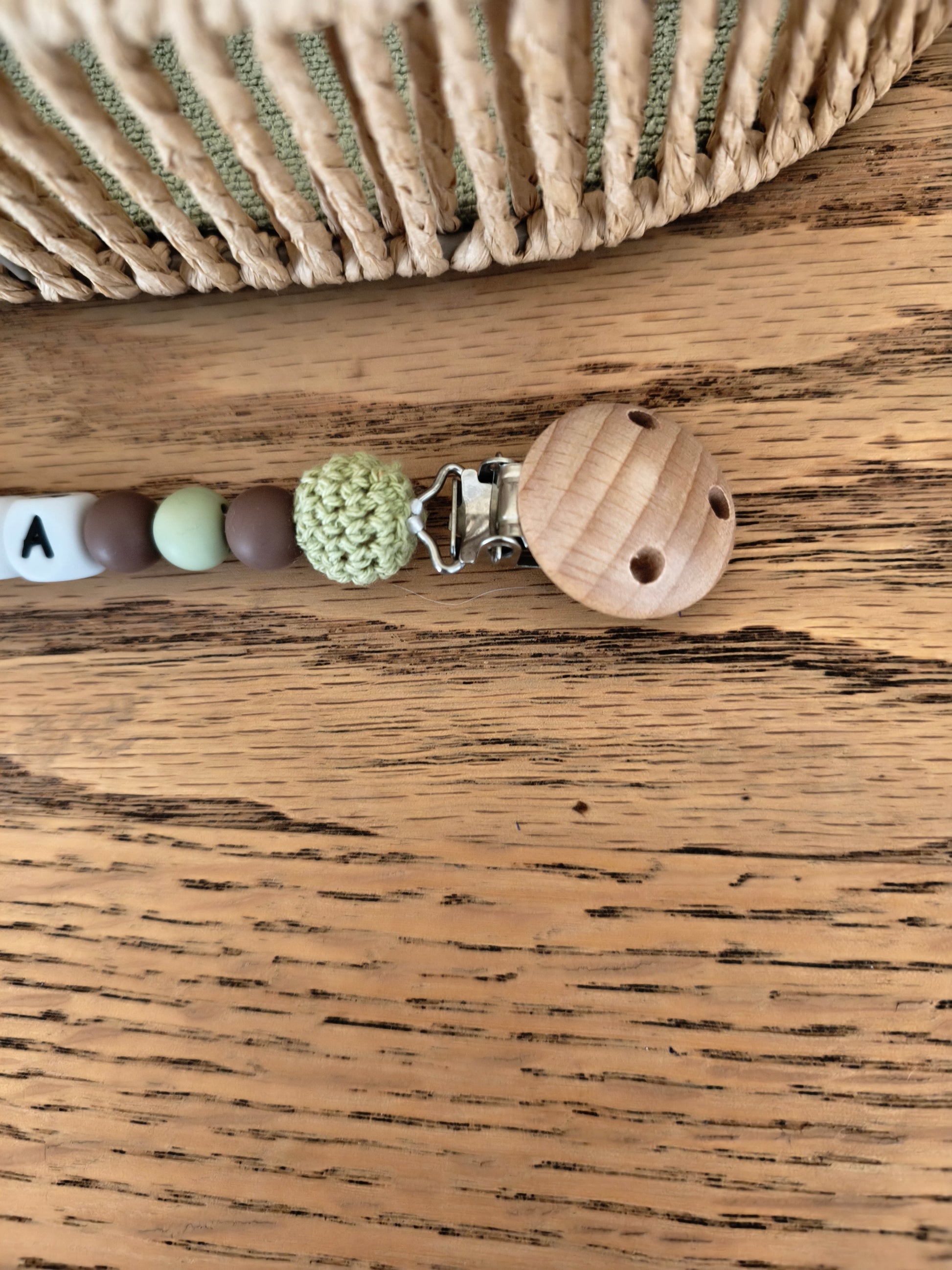 Attache tétine dinosaure